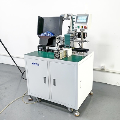 Macchina per l'etichettatura delle batterie a celle cilindriche
